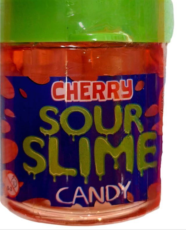 Vibrant orange Sour Slime Candy cherry sour slime in clear jar with green lid