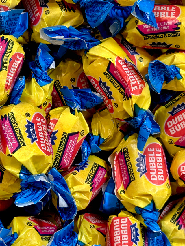 Dubble Bubble original flavor gum in yellow and blue wrappers