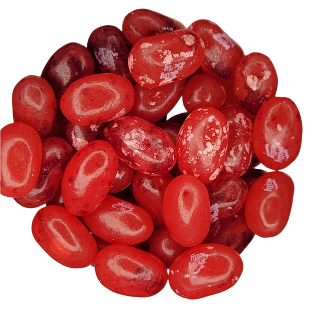 Pile of glossy red Jelly Belly Pomegranate jelly beans with sugary coating