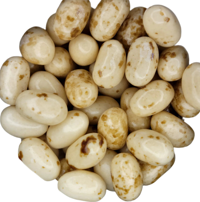 Cream-colored Jelly Belly Toasted Marshmallow jelly beans with brown speckles