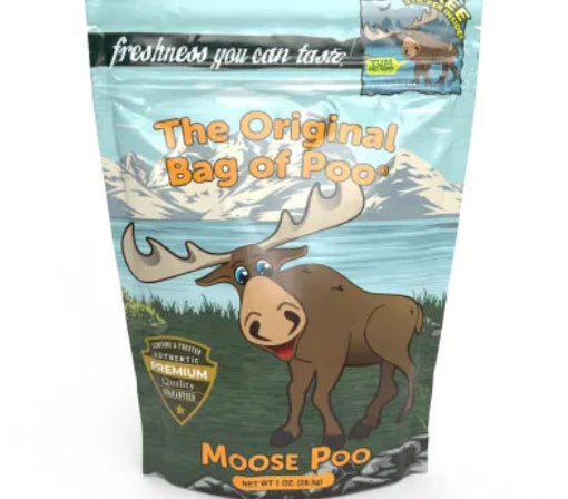 Moose Poo Black Cherry Cotton Candy: light blue green resealable pouch with cartoon moose and mountains
