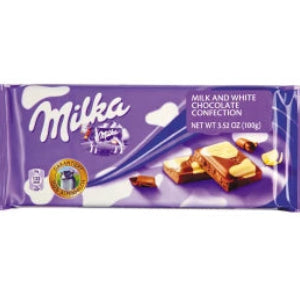 Milka Kuhflecken Cow Spots Bar with purple wrapping and milk white chocolate