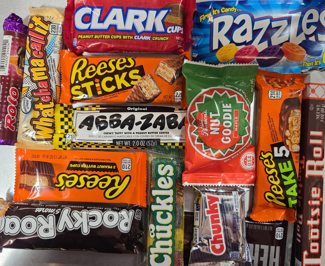 Vibrant assortment of candy bars: Reeses, Clark cups, Razzles, Nutty Goodie