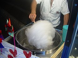 Fluffy white cotton candy swirl ready to serve in Cotton Candy collection