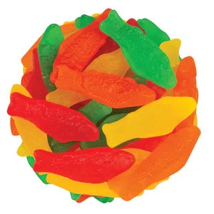 Colorful Swedish Fish gummy candies in red, orange, yellow, and green.