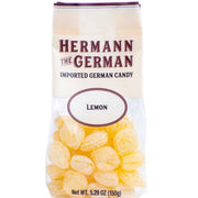 Clear bag of bright yellow oval lemon drop candies from Hermann the German