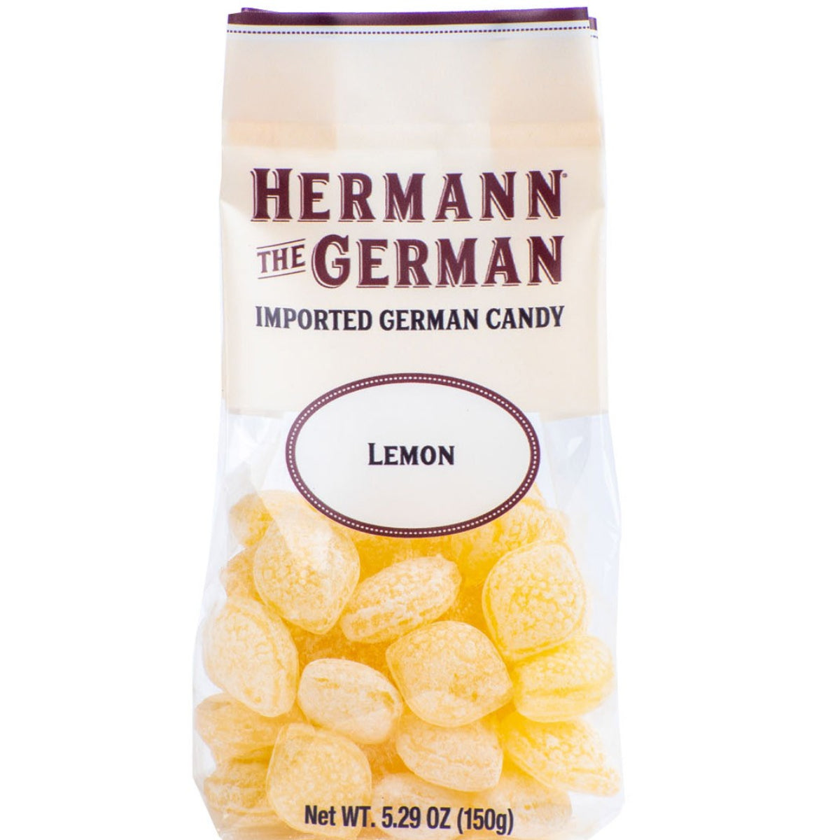 Clear bag of bright yellow oval lemon drop candies from Hermann the German