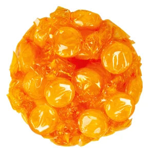 Pile of bright orange Butterscotch Buttons hard candies, individually wrapped