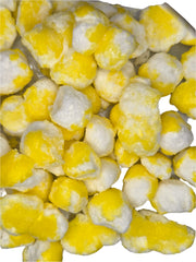 Yellow and white frozen corn kernels in Crazy Bites Lemon Smiley Tarts 3oz