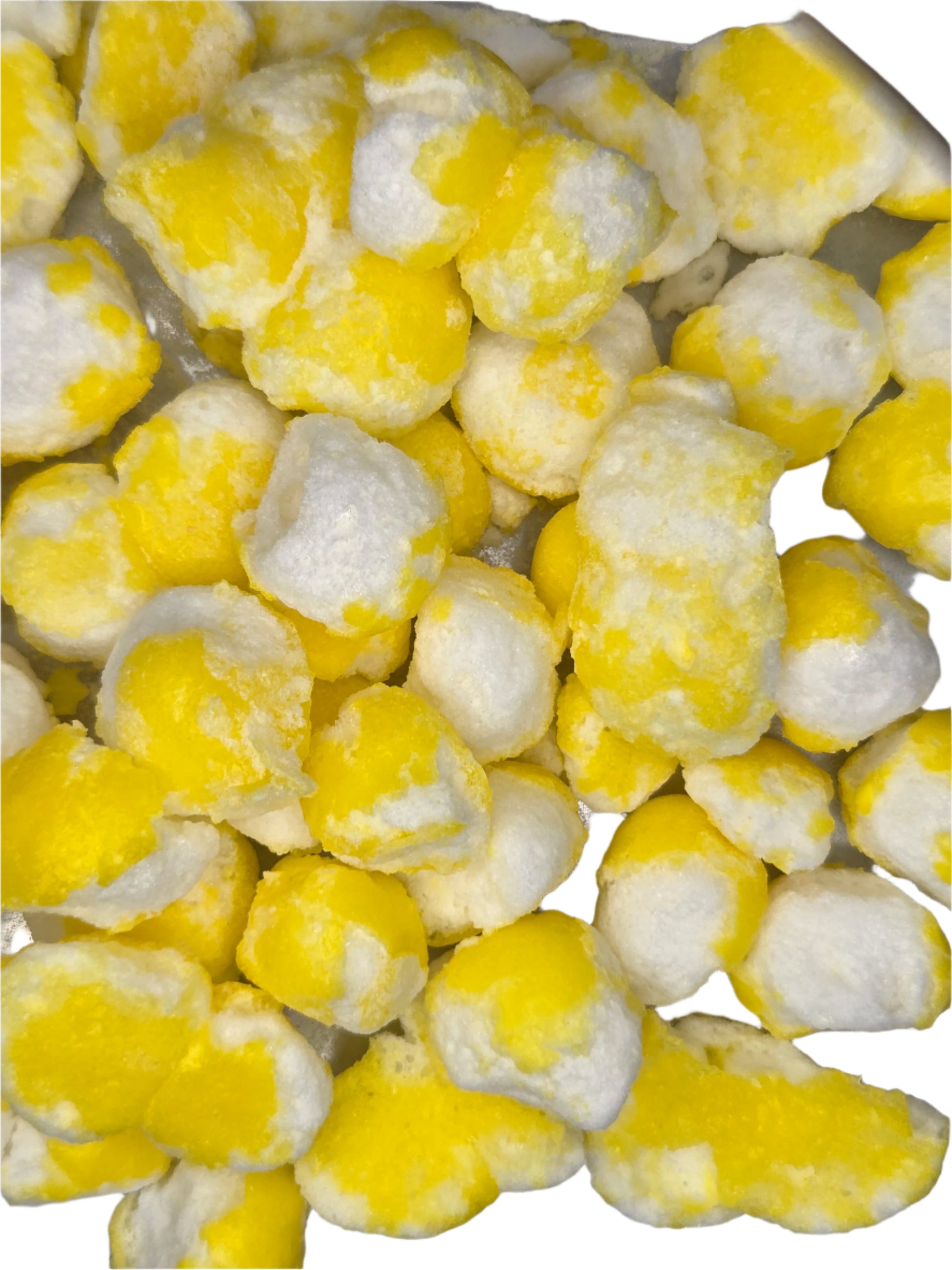 Yellow and white frozen corn kernels in Crazy Bites Lemon Smiley Tarts 3oz