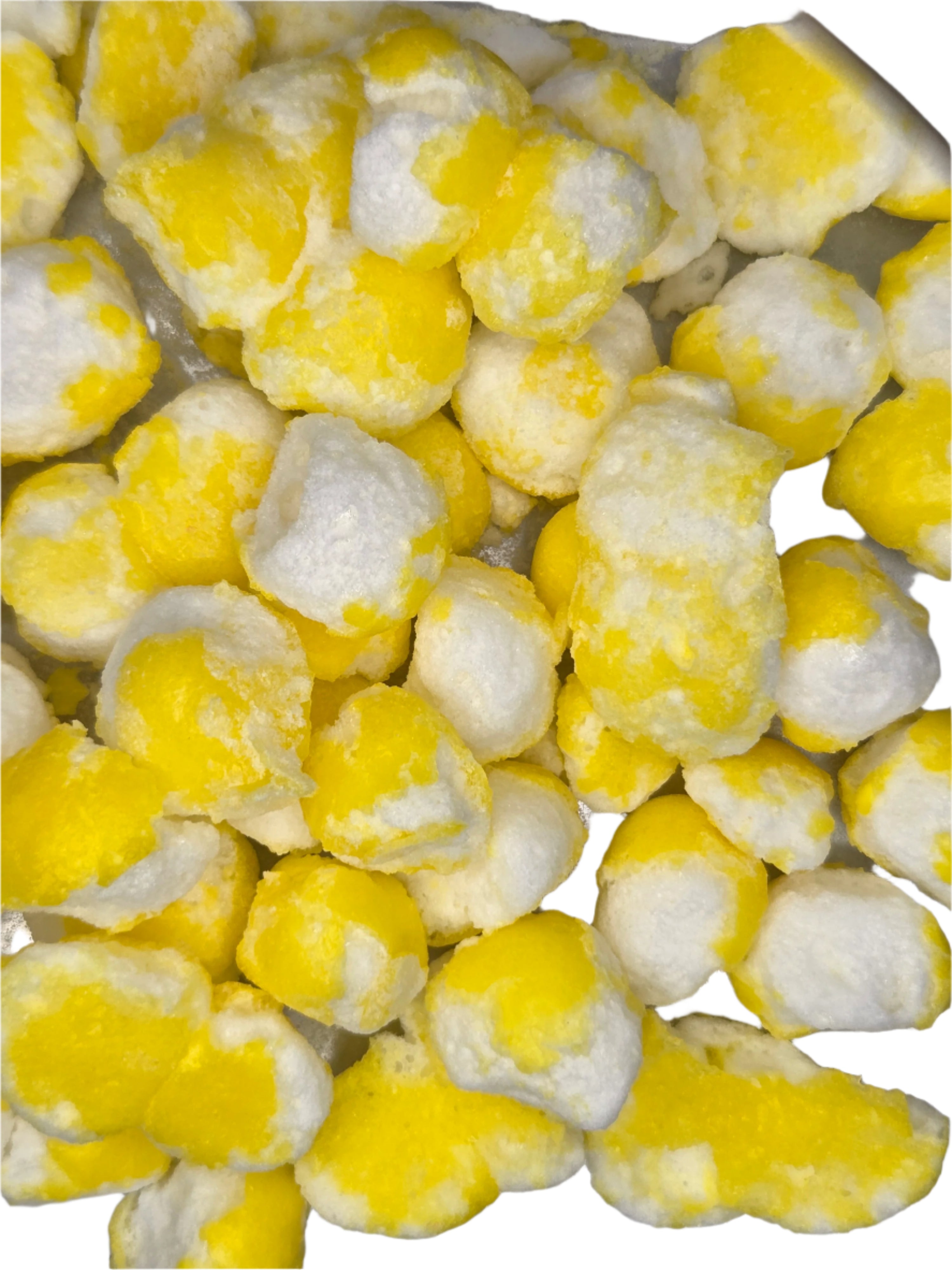 Yellow and white frozen corn kernels in Crazy Bites Lemon Smiley Tarts 3oz