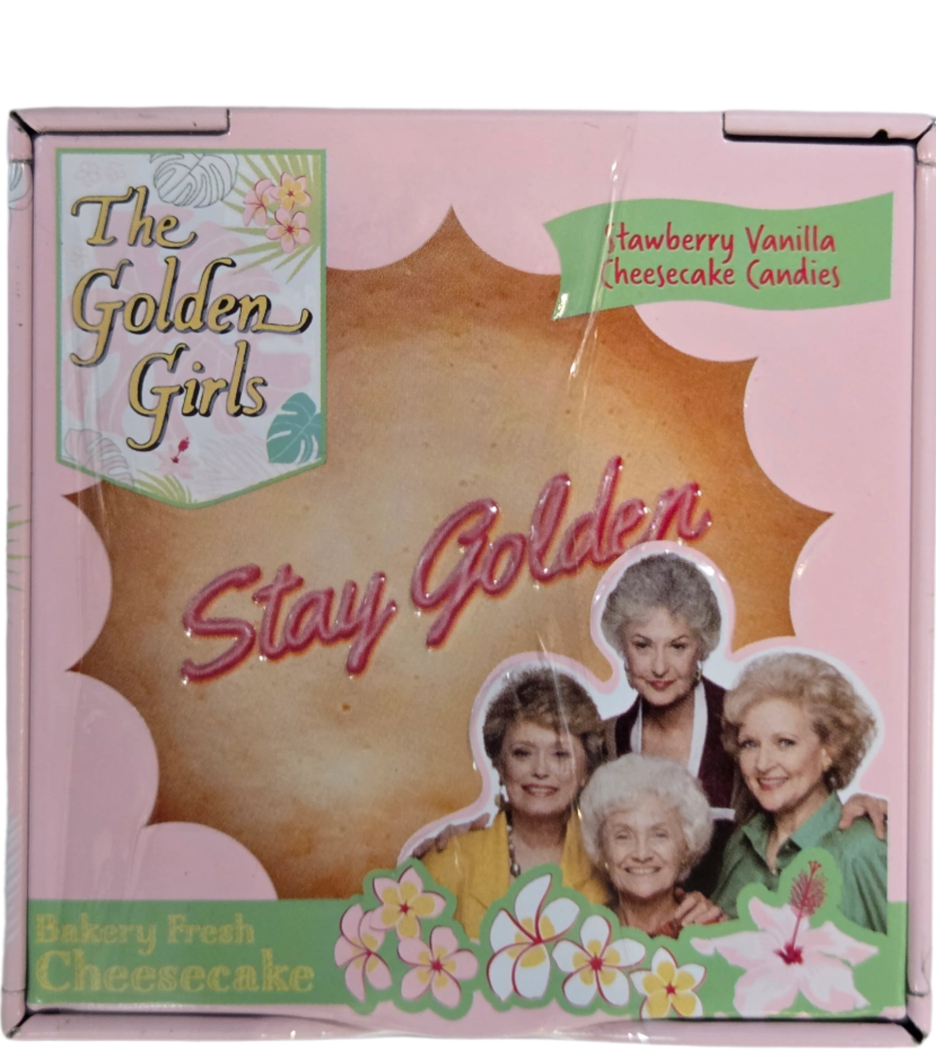 Golden Girls pink cheesecake tin with stay golden text and strawberry vanilla design