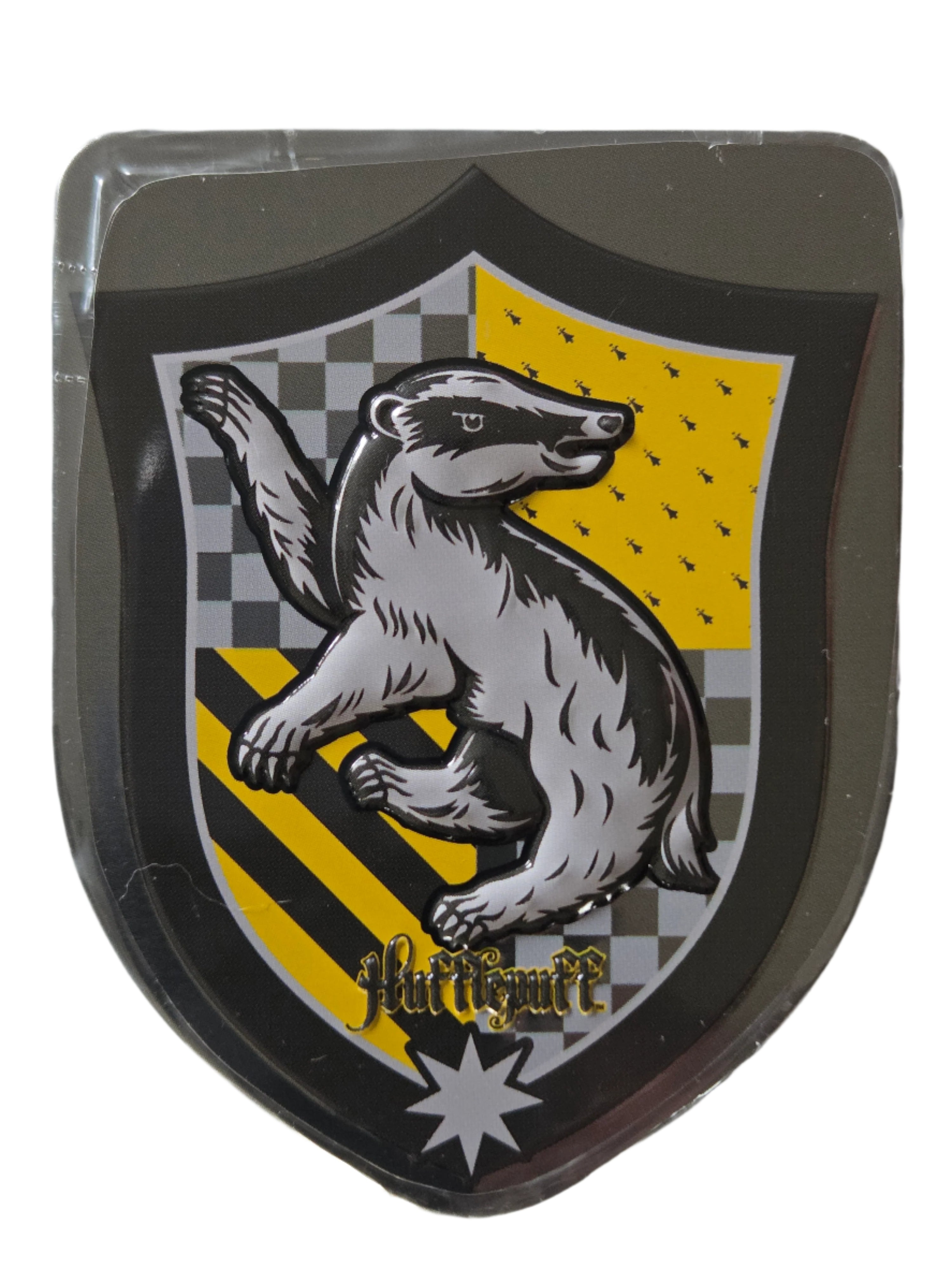 Harry Potter Hufflepuff house crest tin badge with silver badger emblem