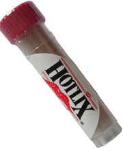 Red-capped transparent tube of Hotlix Cinnamon Toothpix