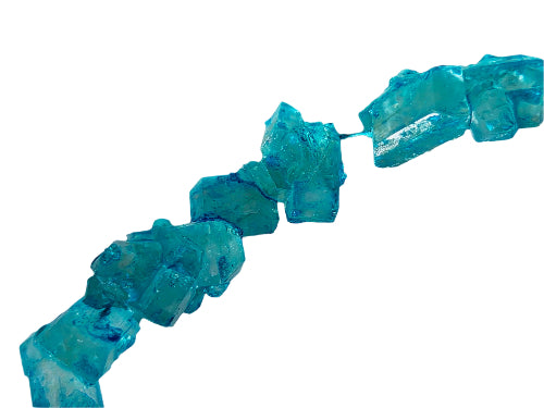 Translucent turquoise faceted crystal beads in Crystal Strings Blue Raspberry