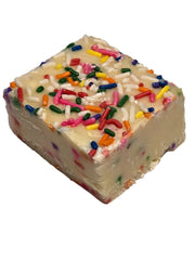 Square white chocolate Birthday Cake Fudge topped with rainbow sprinkles