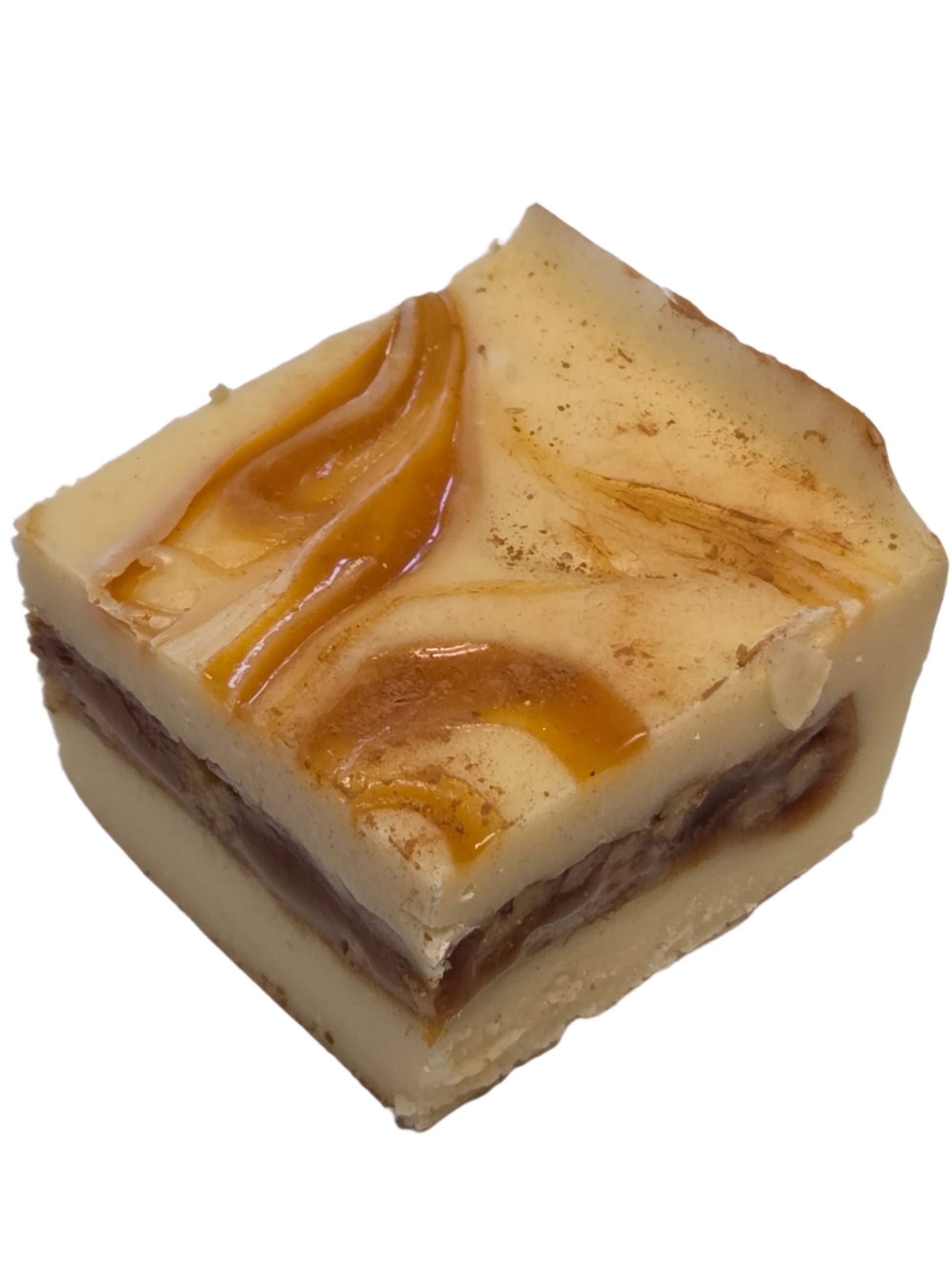 Caramel Praline Fudge: square piece with beige base, brown swirls, amber drizzle