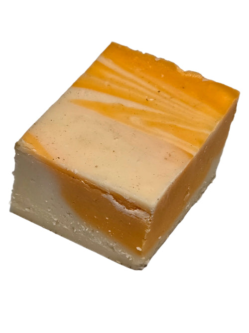 Orange Swirl Fudge marbled soap bar in orange and cream with speckles