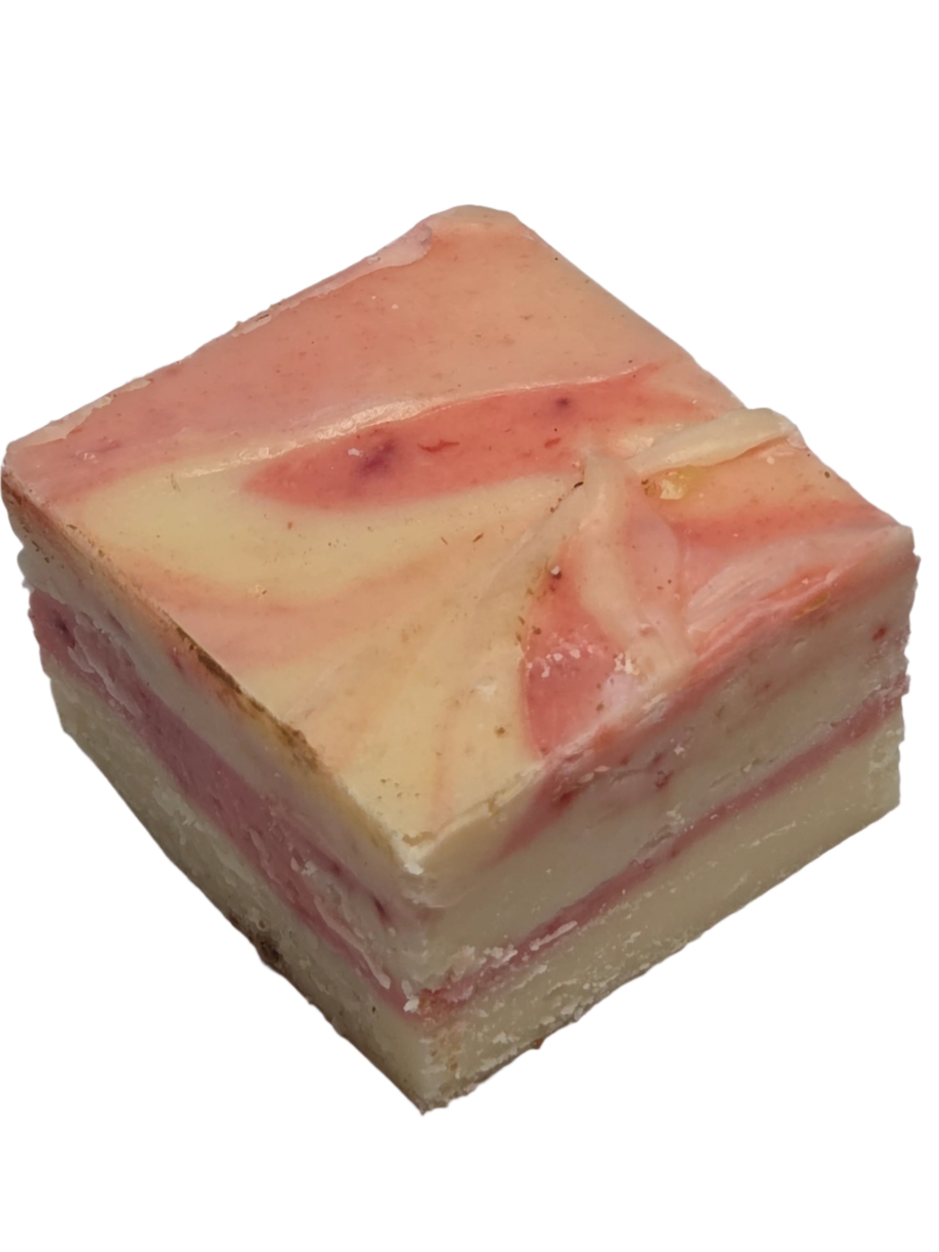 Strawberry cheesecake fudge square with pink cream swirls and layers