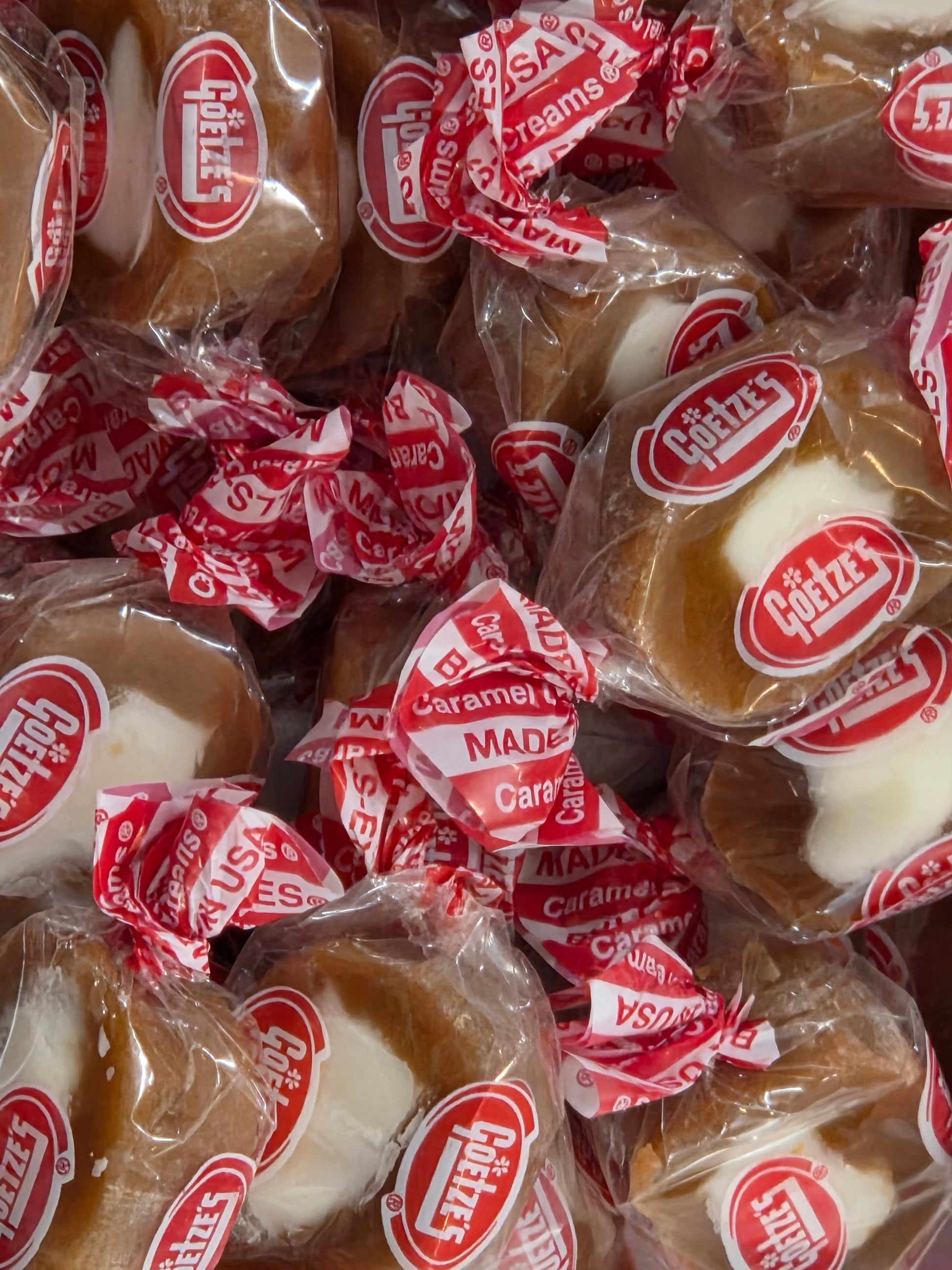 Bull’s Eye Vanilla Caramel Creams: caramel and white chocolate candies in clear plastic wraps