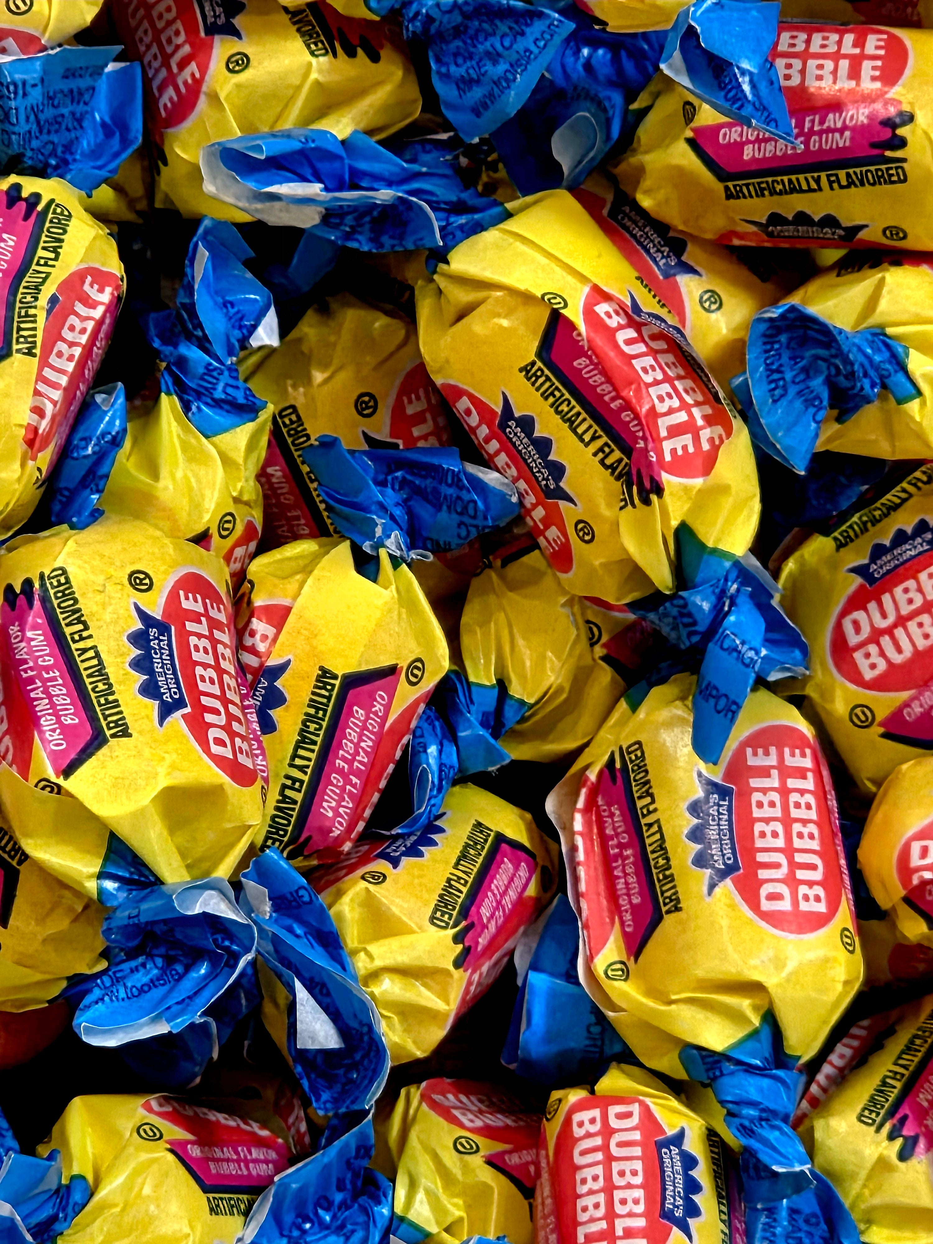 Dubble Bubble original flavor gum in yellow and blue wrappers