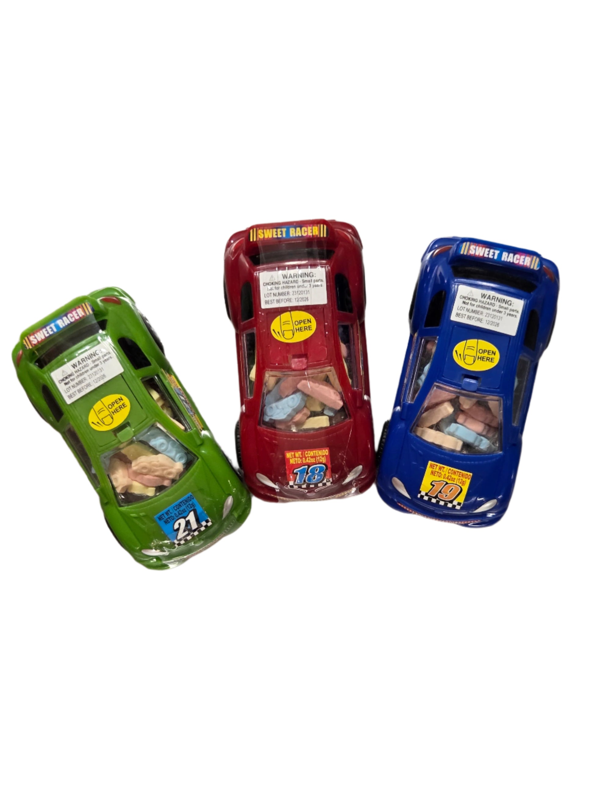 Three colorful Sweet Racer toy cars with candy inside transparent roofs