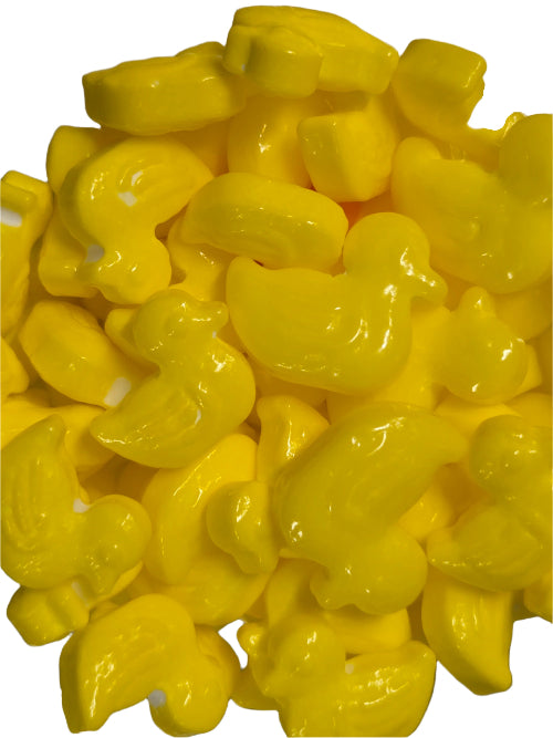 Bright yellow glossy plastic duck-shaped Lucky Duckies candies