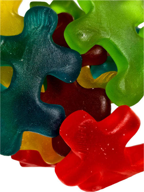 Vibrant translucent Puzzle Pieces Candy in red, green, blue, yellow