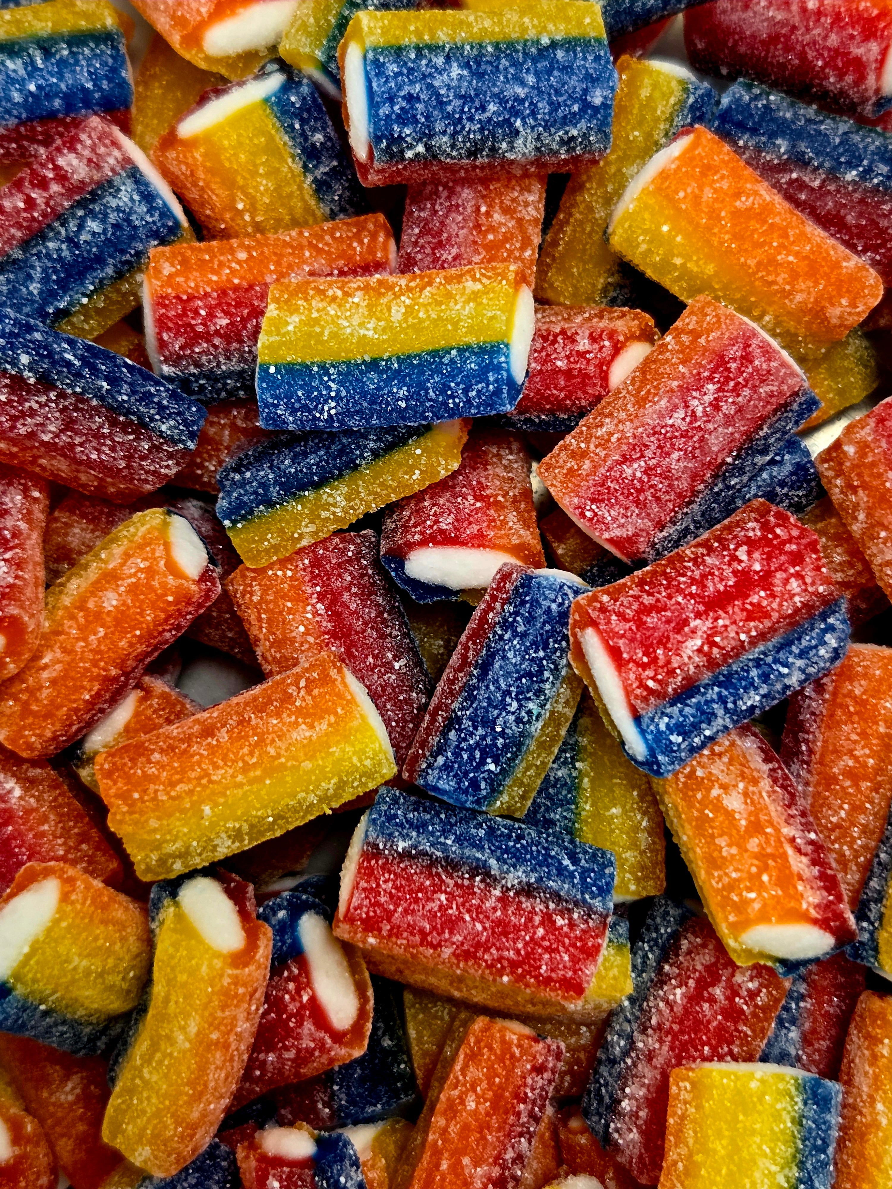 Sour Rainbow Twists: colorful sugar-coated gummy candy sticks in vibrant stripes