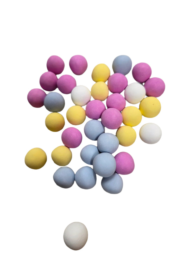 Holland Pastel Mints: pastel spherical candies in pink, yellow, blue, white