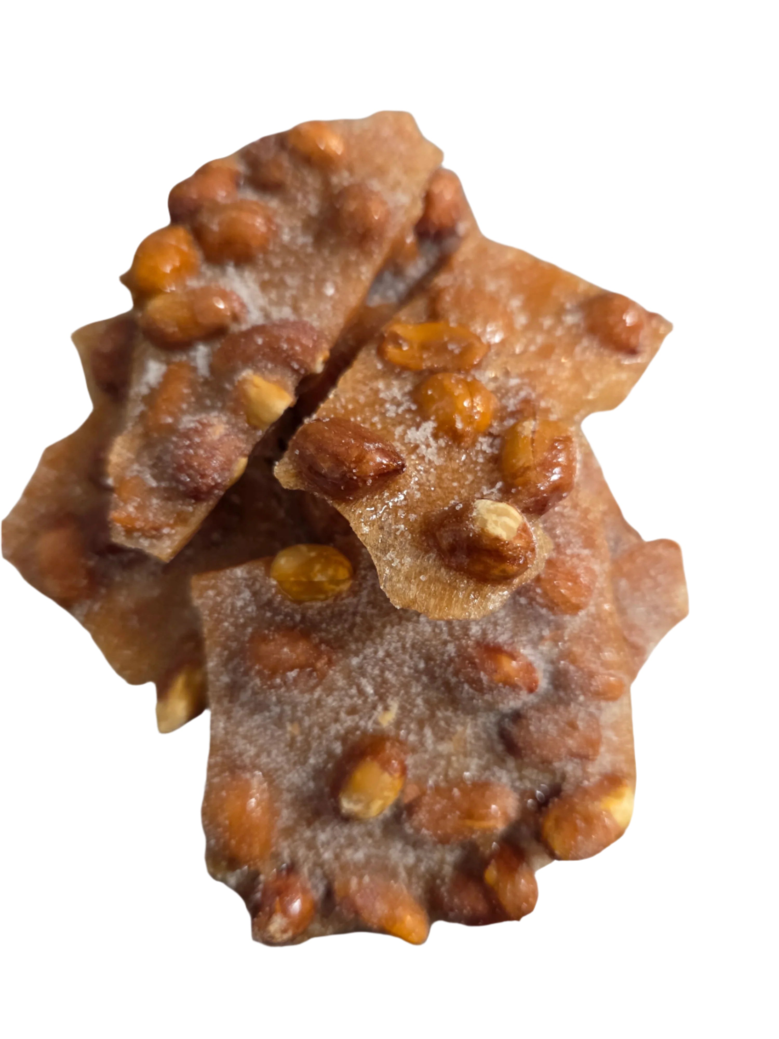 Crunchy amber peanut brittle with whole peanuts, 12 oz box