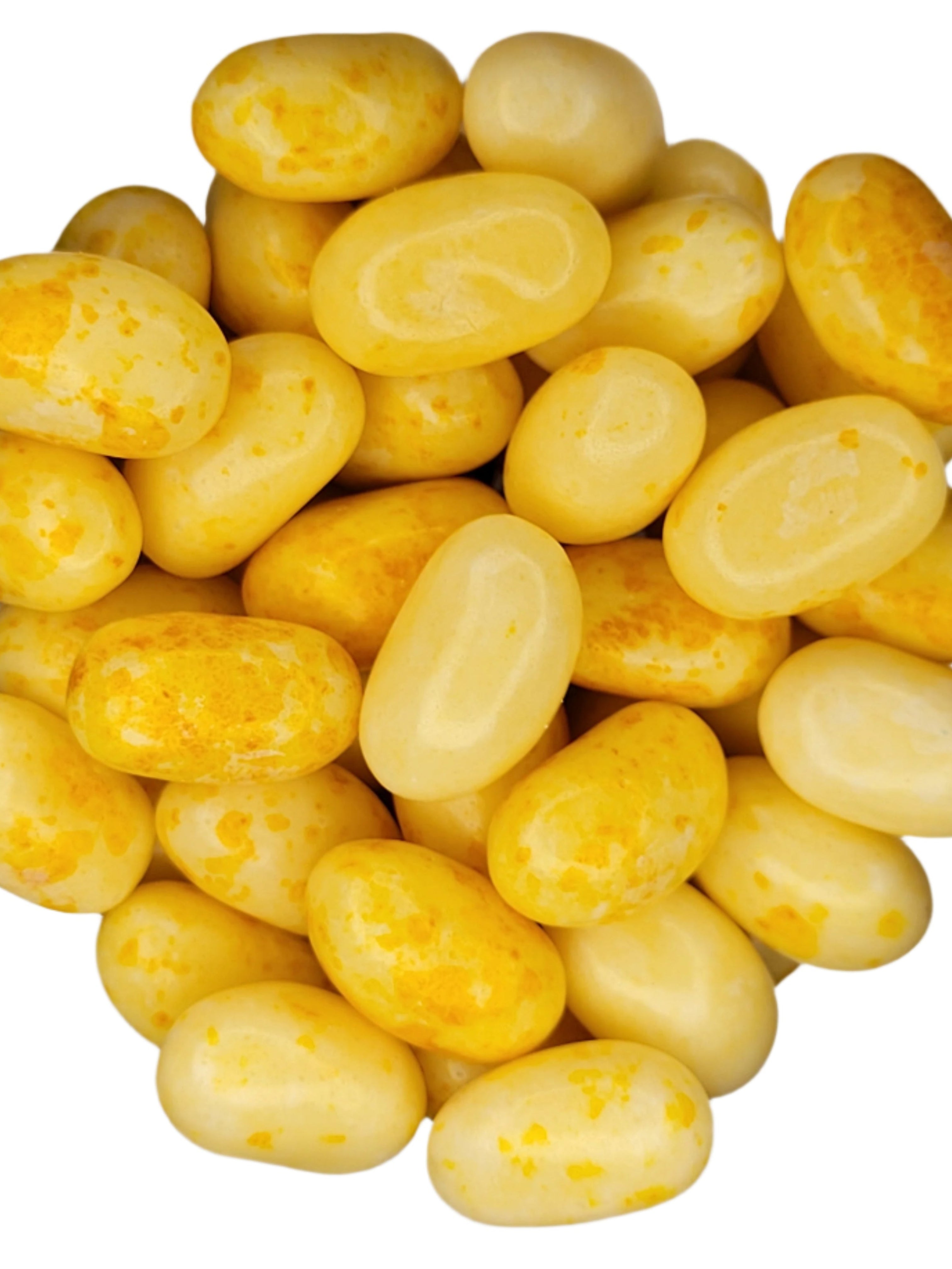 Pile of glossy yellow Jelly Belly Buttered Popcorn jelly beans