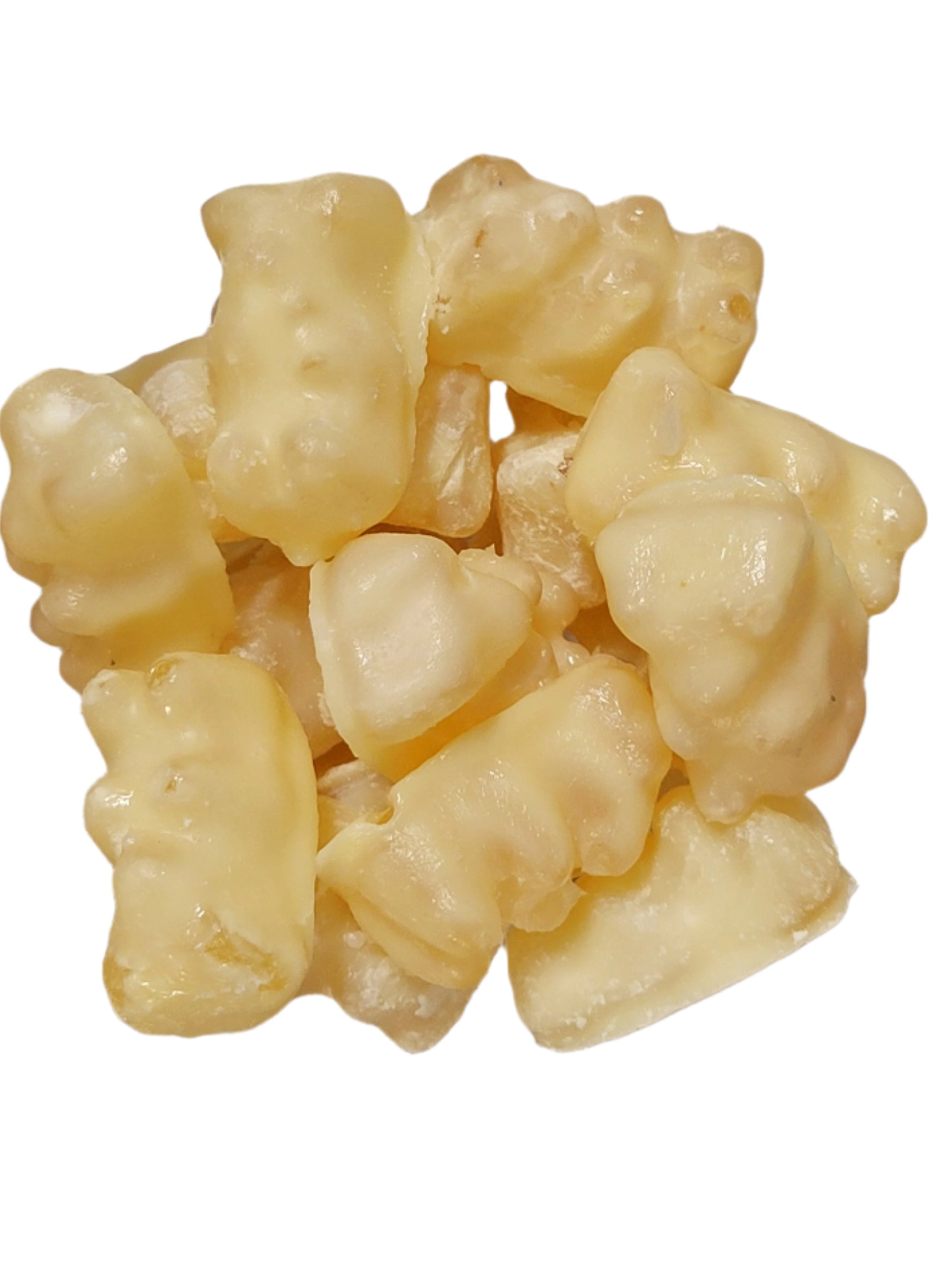 Pile of translucent pale yellow glossy gummy bears in White Chocolate