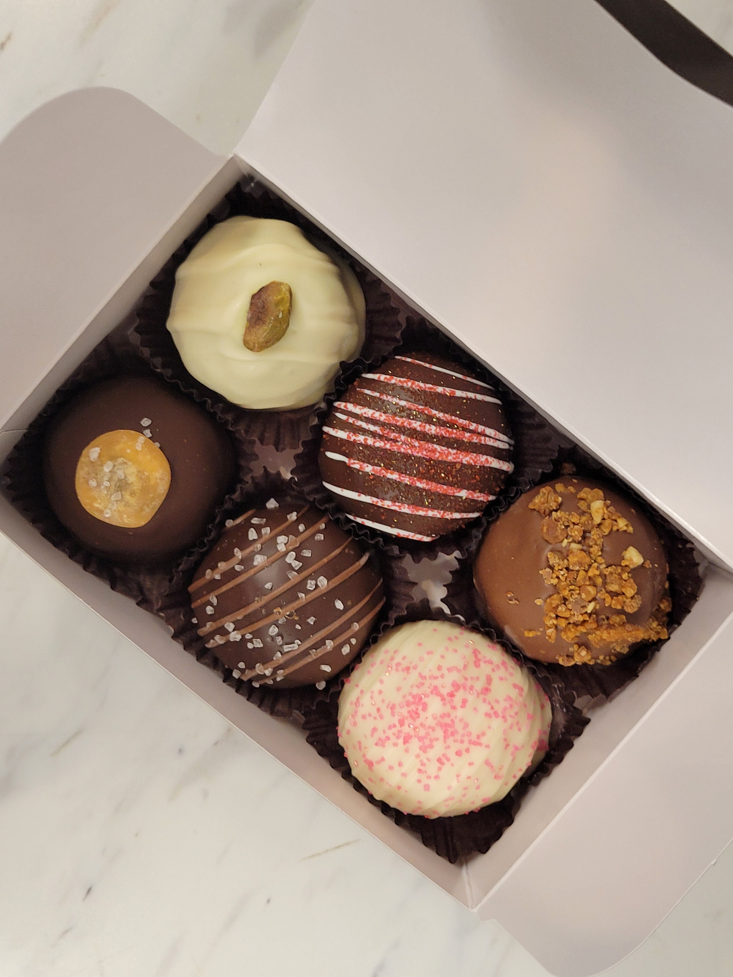 Truffle 6 PK: Assorted chocolate truffles with nuts, salt, and sprinkles