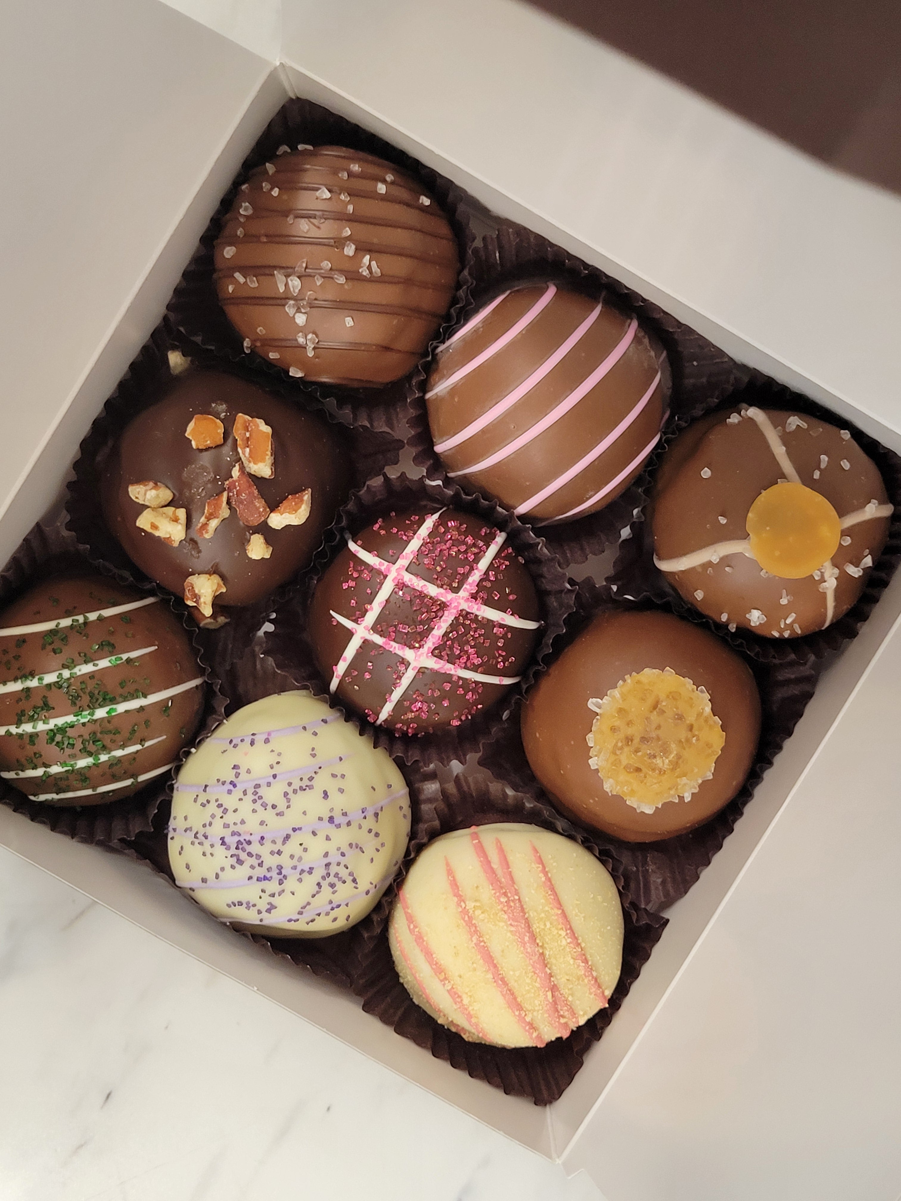 Assorted Truffle 9 PK chocolate truffles with unique toppings in brown, pink, white, gold