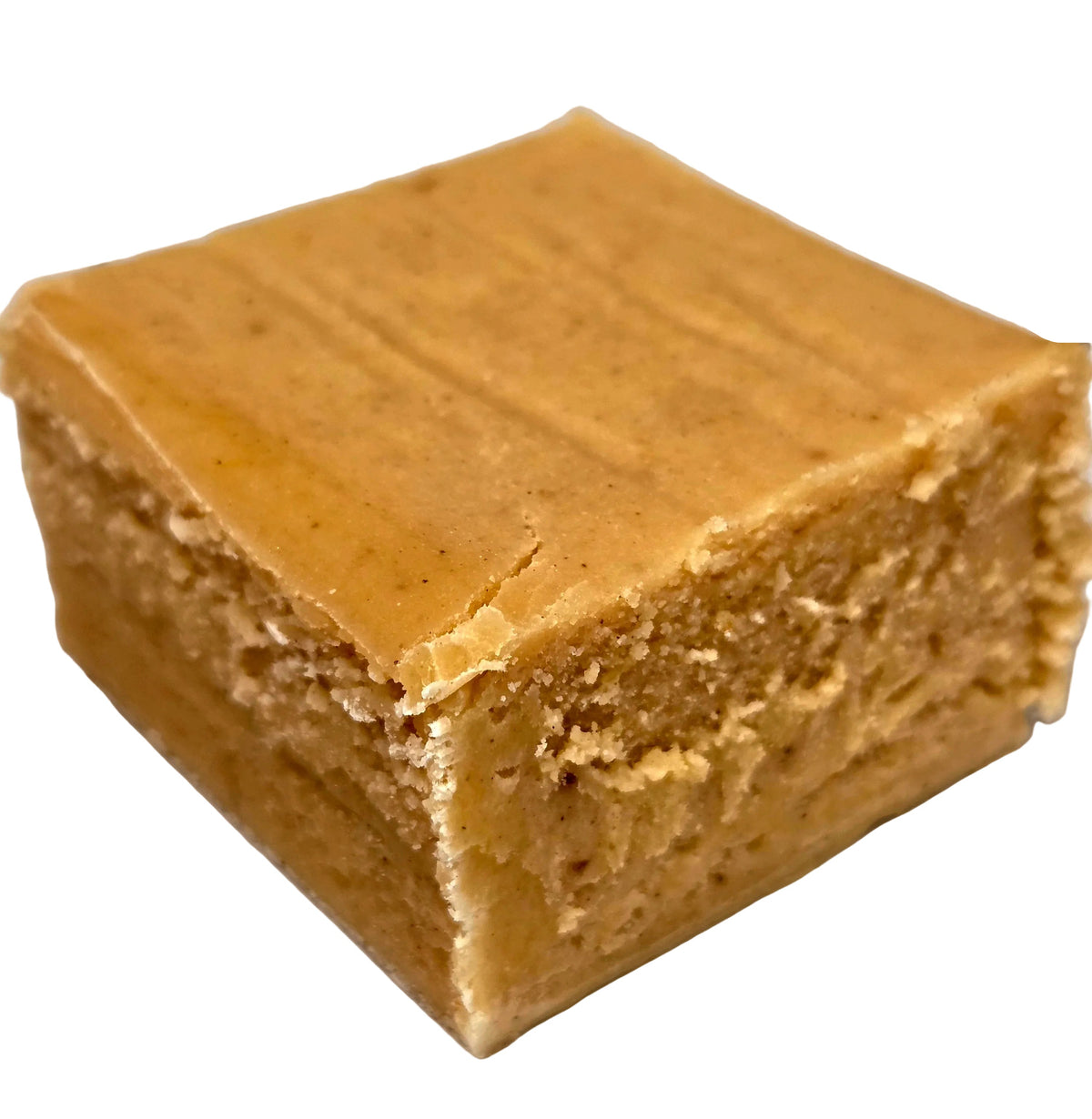 Square golden-brown pumpkin fudge with smooth textured surface and specks