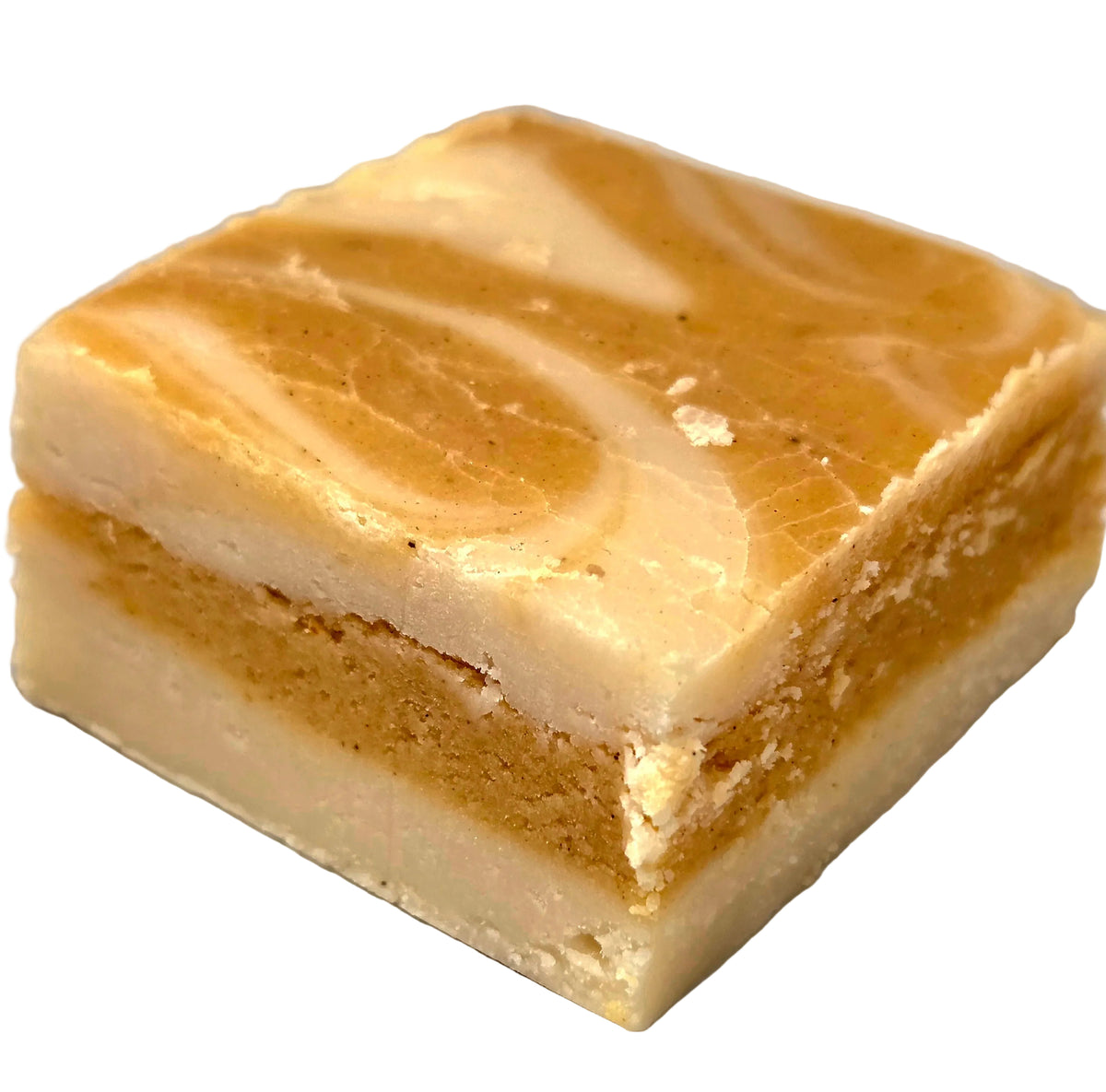 Square pumpkin cheesecake fudge with marbled top and layered interior