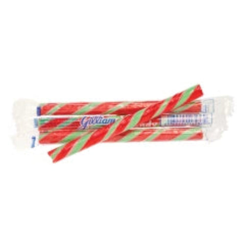 Red and white striped watermelon candy sticks in clear plastic packaging