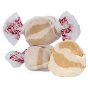 Caramel and white swirl taffy in peanut butter flavor, wrapped in red-embossed clear cellophane