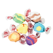 Colorful swirled Taffy Tropical Mix candies in clear cellophane with red branding