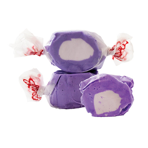 Taffy Huckleberry: purple and white candies in clear cellophane with red branding