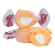 Taffy Tangerine: orange and white marshmallow taffy in clear cellophane