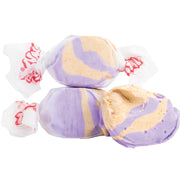 Purple and beige swirled Taffy Blackberry Crumble candies in clear cellophane