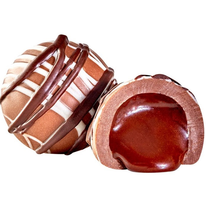 Glossy milk Irish cream truffle with dark chocolate stripes