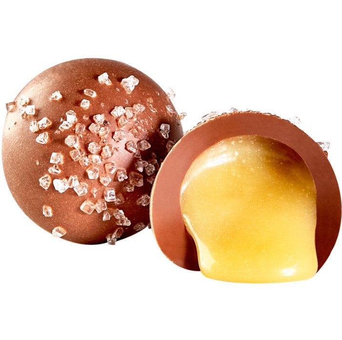 Milk Creme Brulee Truffle: chocolate-covered caramel bomb with gooey interior