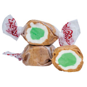 Three Taffy Apple Pie candies in crinkled brown wrappers with red branding