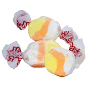 Taffy Candy Corn in orange-white-yellow colors, wrapped in white paper with red branding