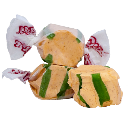 Yellow and green striped Taffy Chili Mango taffy in white paper with red branding