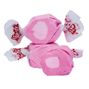 Pink Taffy Bubble Gum candies wrapped in white paper with red patterns