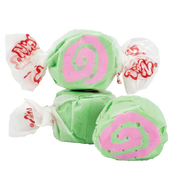 Green and pink swirled Taffy Cherry Limeade candies in white wrappers